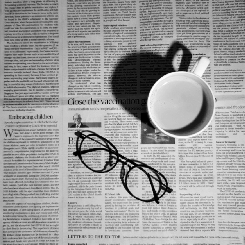 newspaper and glasses